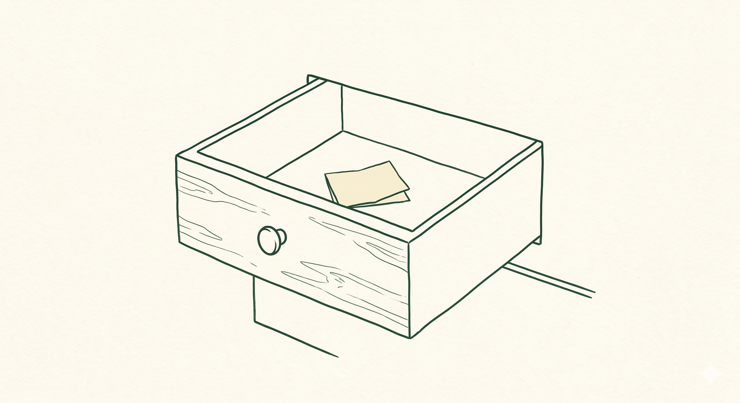 A line drawing of an open wooden drawer with a small folded note resting inside.